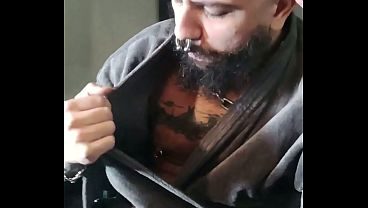 Tattoed daddy smoking a cigar in his smoky robes