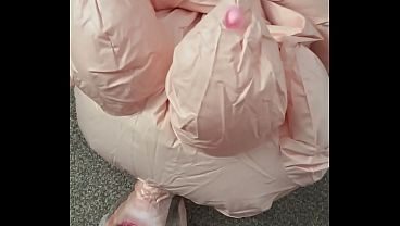 Inflating a granny blow up doll