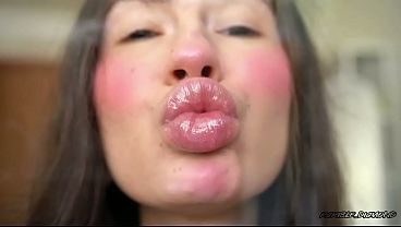 Pillow-soft Glossed Lips in a Melting Sensual Kiss