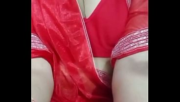 Indian Gay Crossdresser Bottom Gaurisissy pressing and playing with her big boobs in red saree with heavy jwellery