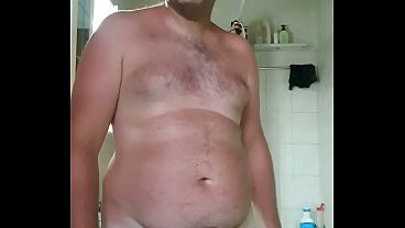 Nude boy in bathroom