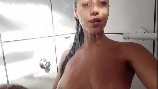 Latina washing her pussy and then getting wet with her cum