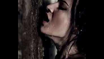 Dark haired babe passionately kissing and licking a wall. Weird fetish - AI Generated