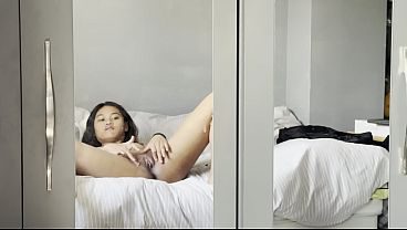 Emma P skinny asian teen puts cream on her shaved pussy