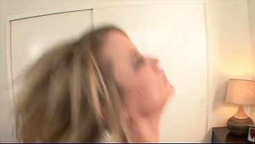Blonde MILF in lingerie fucks a young guy on the double bed