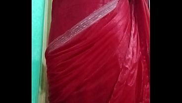 Indian Gay Crossdresser Bottom Gaurisissy pressing her big boobs and feeling horny in red saree with heavy jwellery