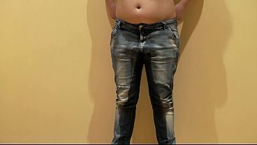 A brunette pees in her jeans. Amateur fetish compilation. A lot of urine.