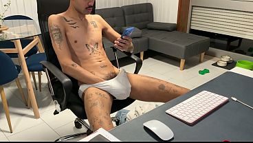 Skinny guy in jeans, pulls his dick out and jerks off on webcam.