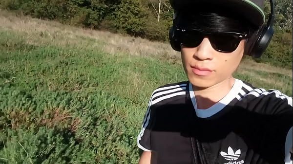 Jon Arteen pulls out his beautiful penis and urinates outdoors. Asian gay pornography featuring an effeminate young man.