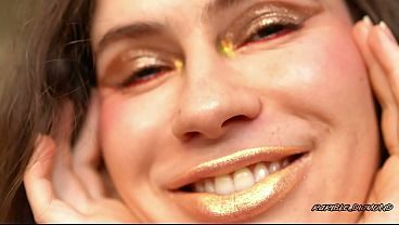 Extremely Shiny Metallic Golden kiss Close up