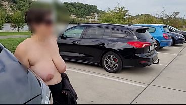 Milf's big saggy tits exposed in public