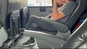 While traveling on the bus, I invite a stranger to suck my cock, and she accepts.