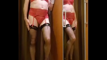 Crossdresser wearing red hunkemoller lingerie