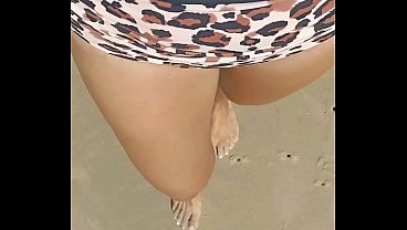 Bikini wetting on the beach